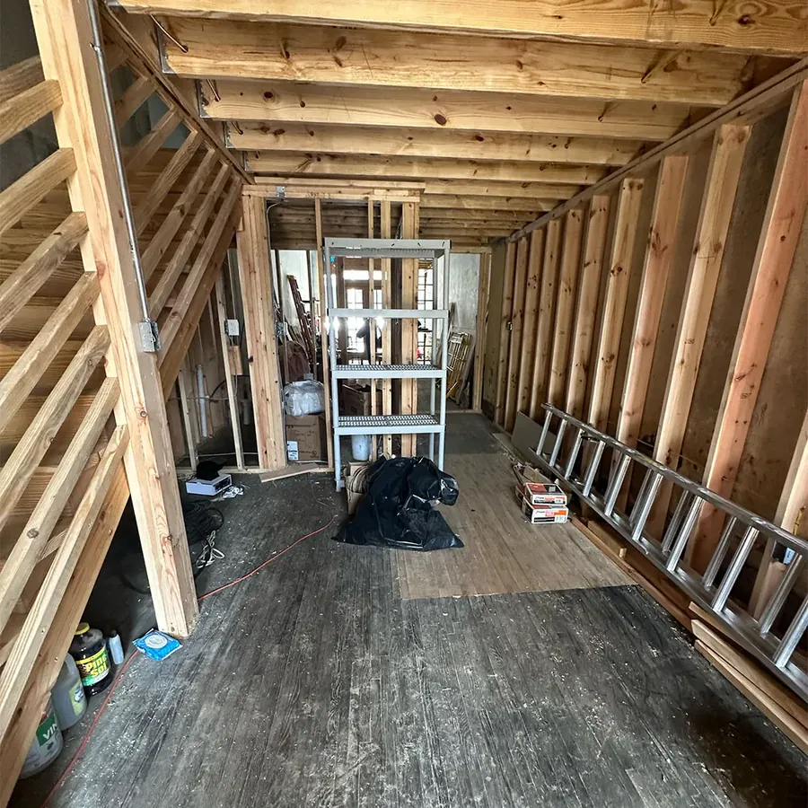 New wall framing inside the Marshall Music Exchange